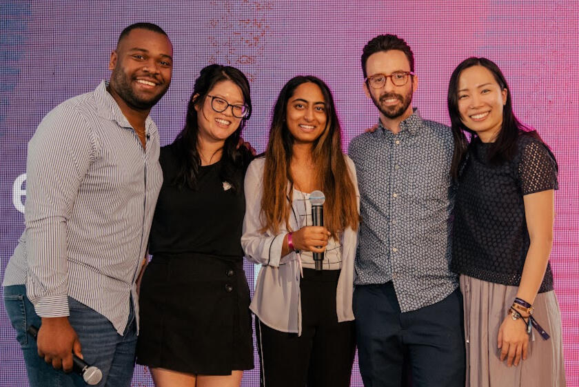 Team NCK on stage as winners